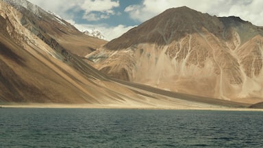 The extraordinary colours of the lake and mountains surrounding this remote part of Northern India make the arduous journey from Leh so worth it. The final scene of the Bollywood blockbuster "3 Idiots" was filmed here, which means that there are plenty of domestic tourists around. But it doesn't take too much effort to walk along the shore until you have the wilderness all to yourself.
Read more at
http://www.aboveusonlyskies.com/sublime-colours-pangong-tso/