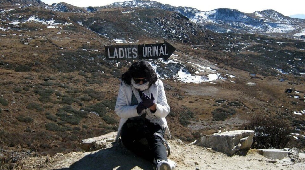 #Snow
I had to take this photo. It was too funny,my friend was so tired of climbing steps that she sat under this awesome sign without realising where she sat.