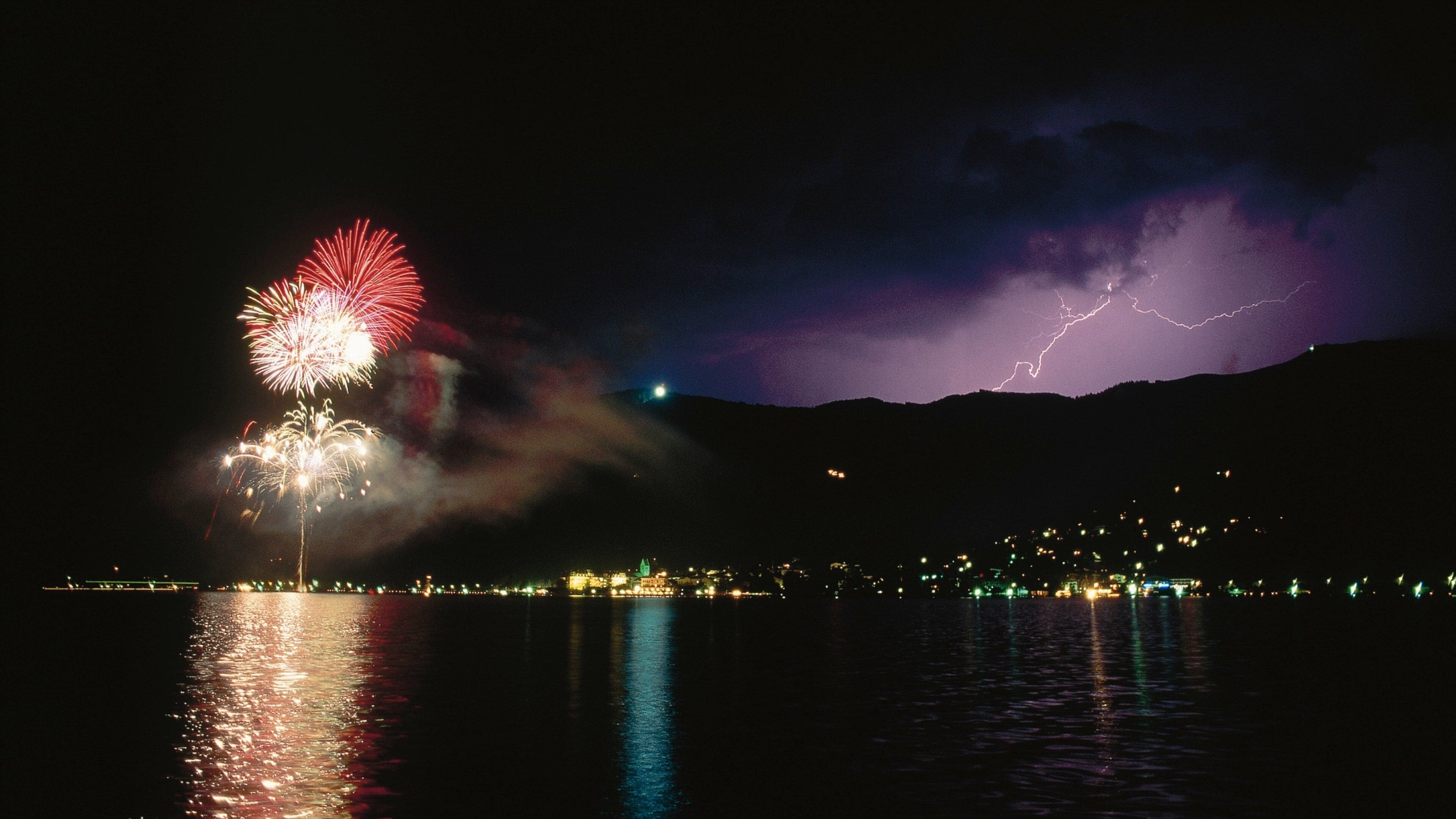 Zell am See showing night scenes, a lake or waterhole and nightlife