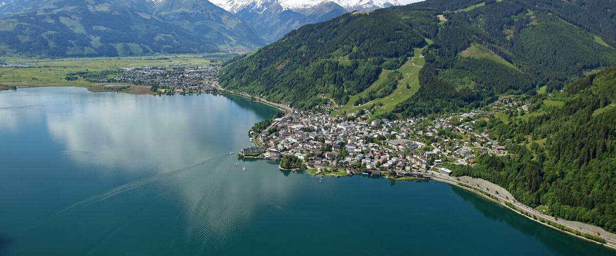 Zell am See showing mountains, a lake or waterhole and general coastal views