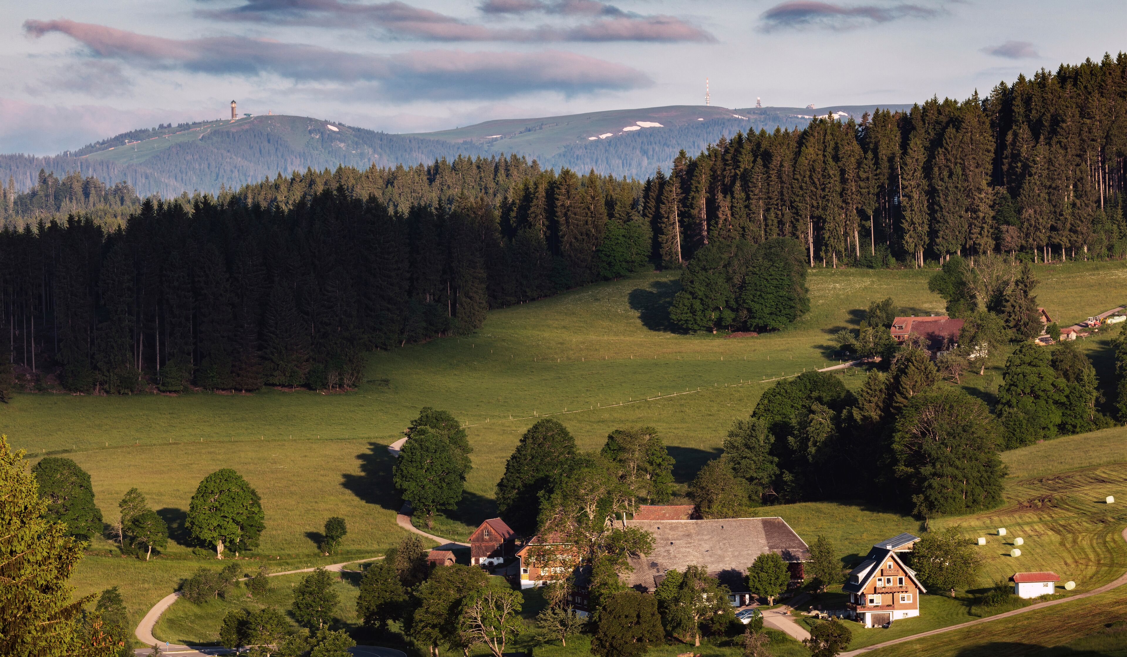 Saig in the morning light with a view of the Feldberg in the Schwarzwald