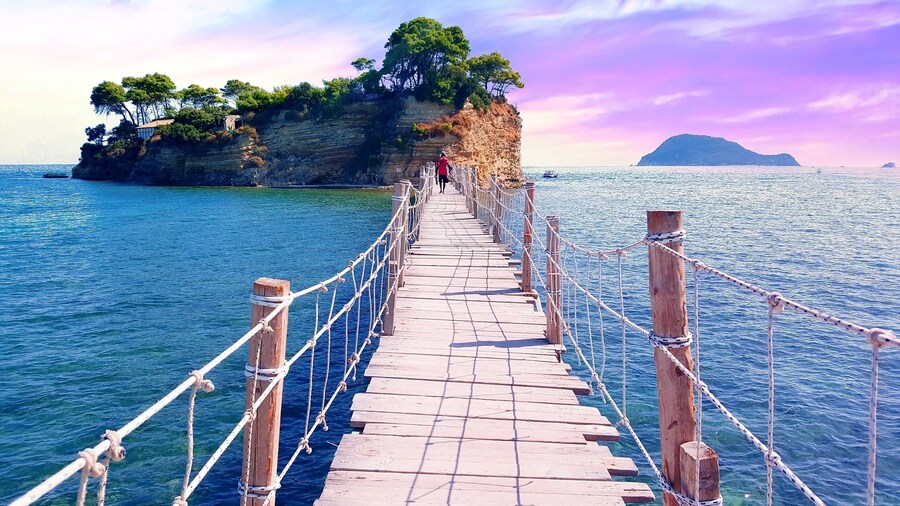 This is Cameo Island. A small private island off the shore of Laganas which is often used for weddings as it offers a romantic atmosphere and stunning views of the Ionian Sea.