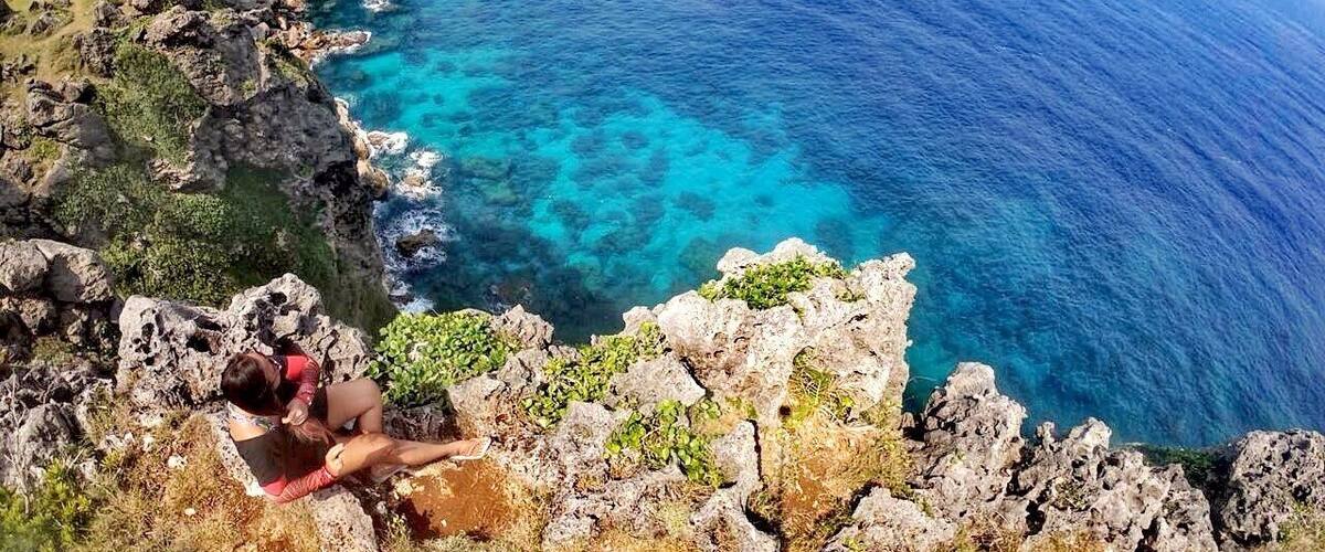 From the main island of Basco in Batanes, one has to travel around 3 hours via Faluwa (a local boat without outriggers that is designed to "ride" big waves) in order to get to Itbayat where Torongan Cliff is located. There is also a short path leading to a cave below this view point. #LocalSecrets #ItsMoreFunInTHePhilippines #Adventure
