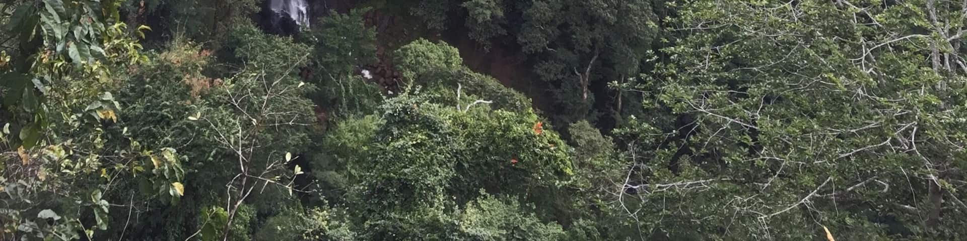 Waterfall hikes up to Livingstonia, Malawi. You can also stand at the top of the falls and in a cave behind them
