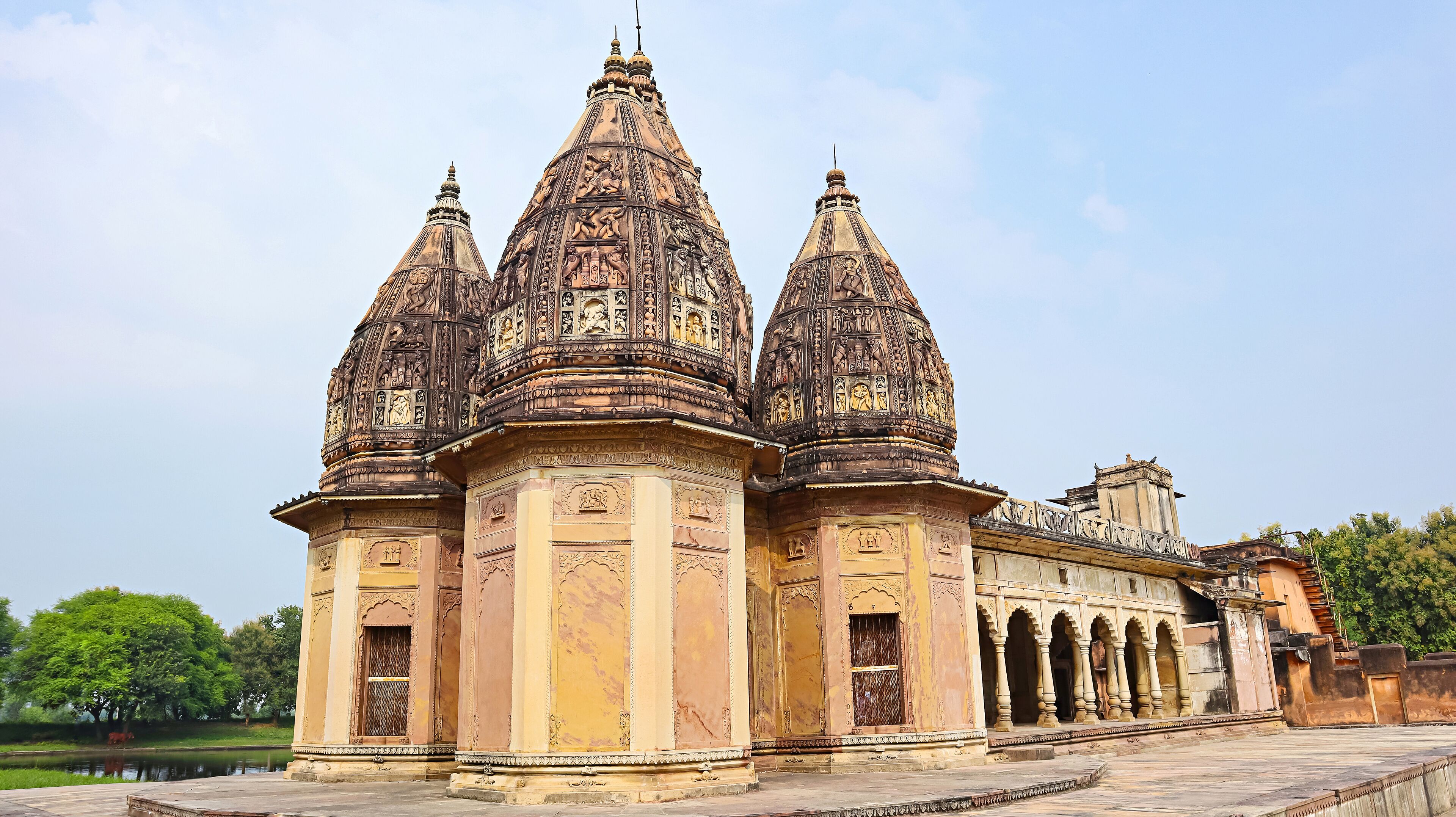 Carvings depicting human life and Hindu deities on the shikhara (spire) of Ganesh Bagh Temple, located in Chitrakoot, Madhya Pradesh