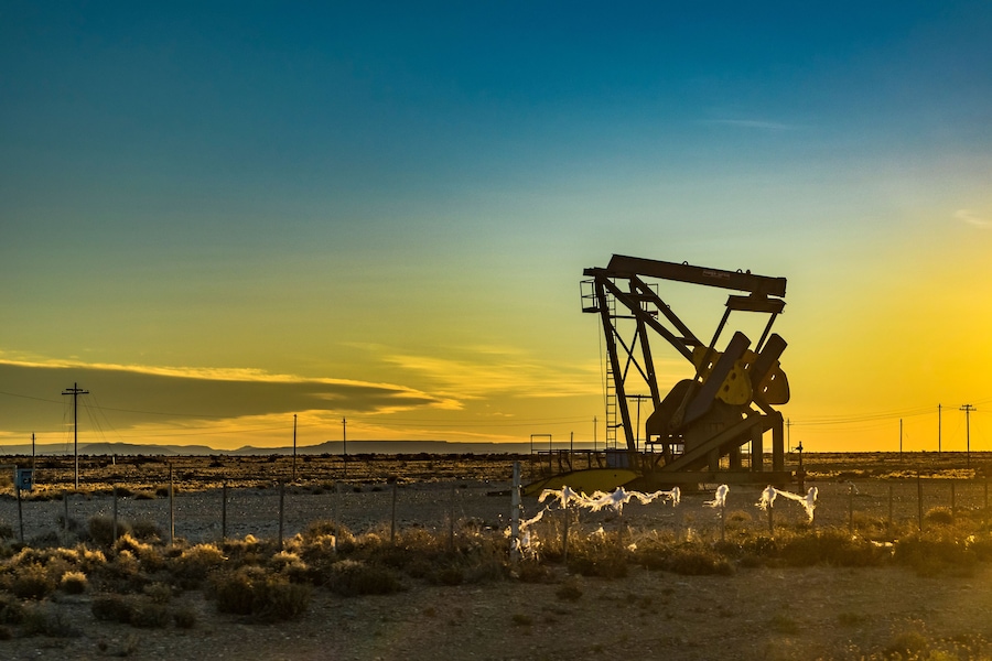 Sunset scene from road with oil machine at outdoor in argentinian patagonia, Santa Cruz province