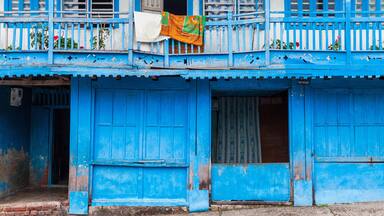 Traditional Two-Storey Blue Wooden Housefront – Dharan, Nepal