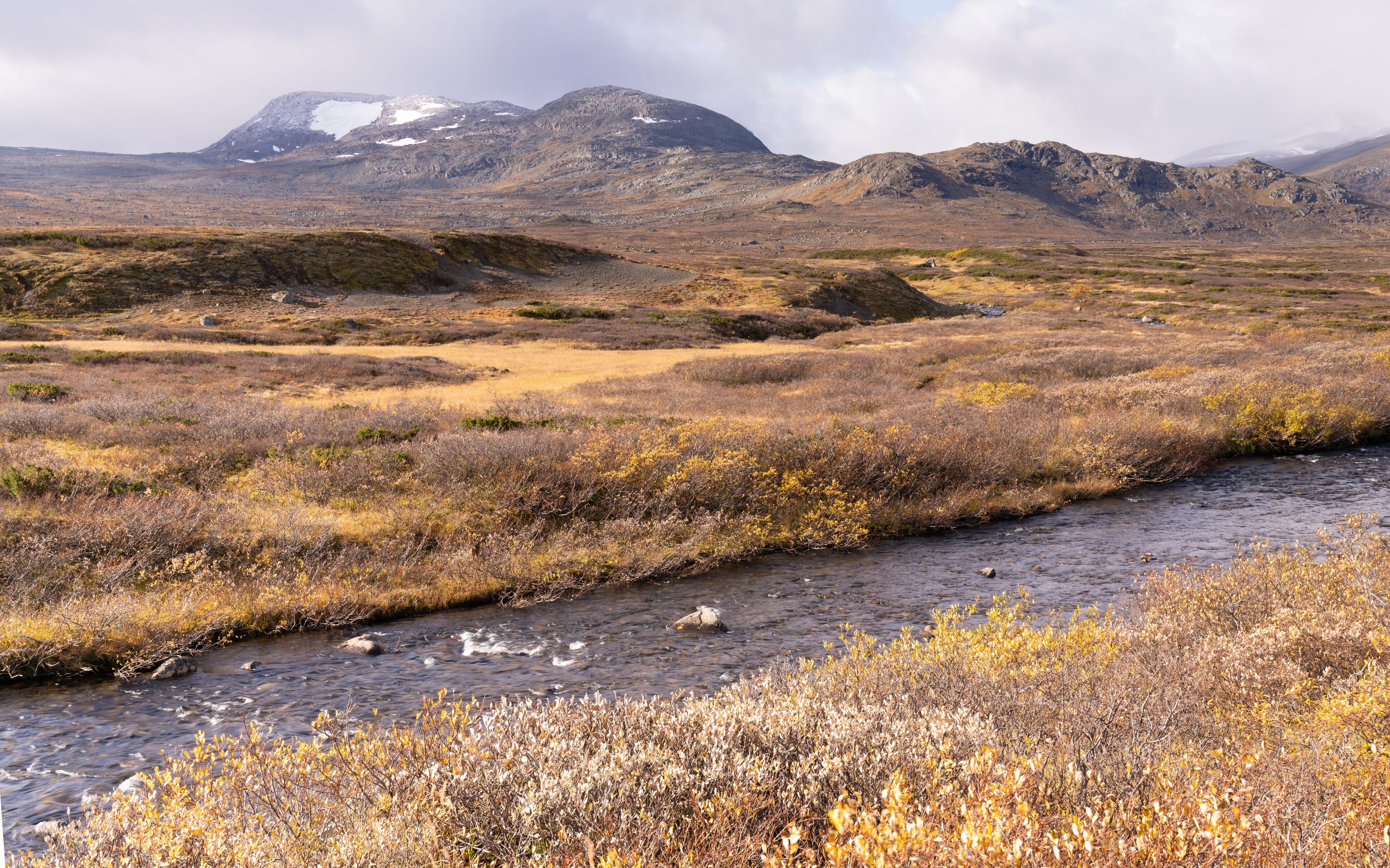Typical landscape in Jotunheim National Park in Norway during autumn time in the Beitostølen area overlooking the Leirungsae River