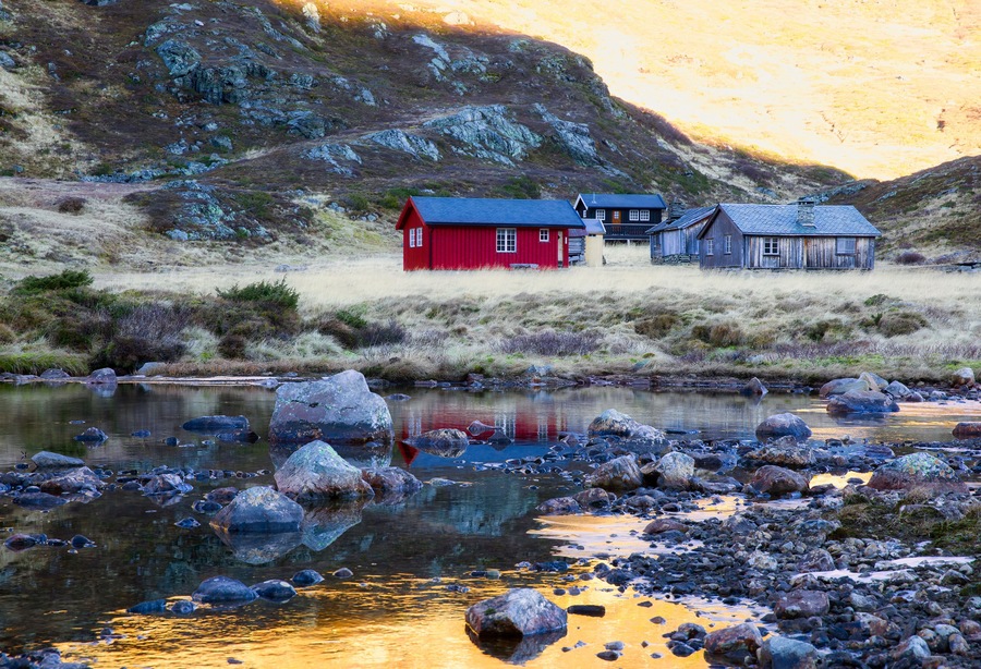 Old Agricultural Buildings by River Rysna at Kleivaslette in Beautiful Herredalen Valley in Vang Municipality, Valdres, Norway