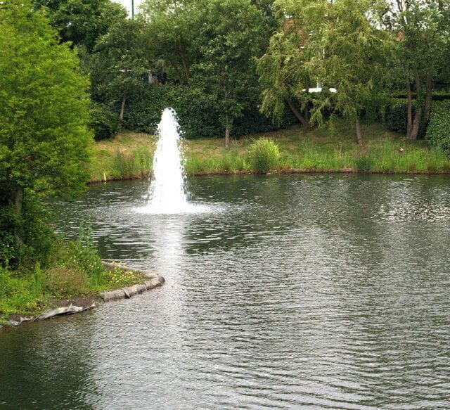 Fountain in man made lake at the rear of the Aztec Hotel. Lake drained and rebuilt in 2006.