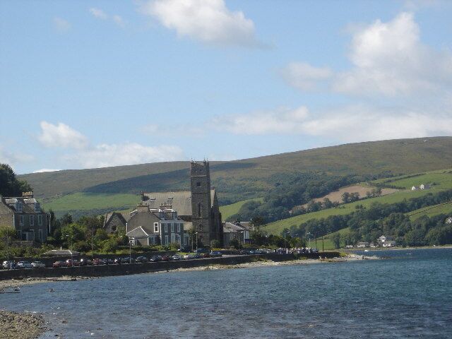 Port Bannatyne, Rothesay. Wedding emerging from church in distance
