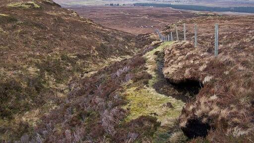 Valley on Ben Grasco A small burn has created a valley on the craggy north facing slope of the hill.