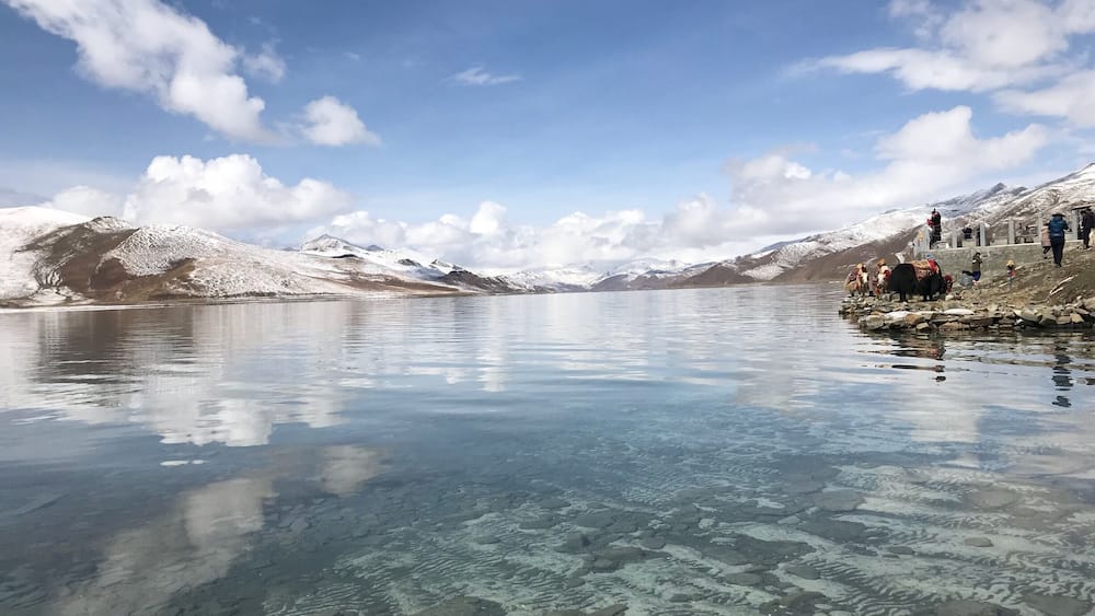 Yamdrok Lake is a freshwater lake in Tibet, it is one of the three largest sacred lakes in Tibet. It is over 72 km long. The lake is surrounded by many snow-capped mountains and is fed by numerous small streams.