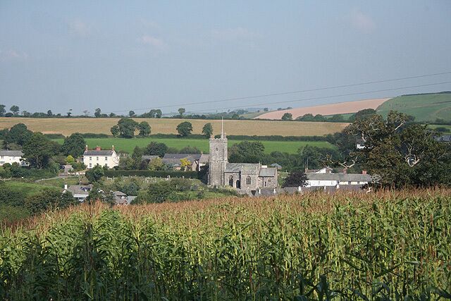 Landkey: St Pauls church, Landkey Town Seen from a point near Venn Lane End crossroads, by a maize field. The church's small south transept next to the porch is a chapel of the Acland family. Landkey is thought to be a corruption of Llan and Cei, or the church of the Celtic saint St Kea, probably the original, rare, pre-Saxon dedication