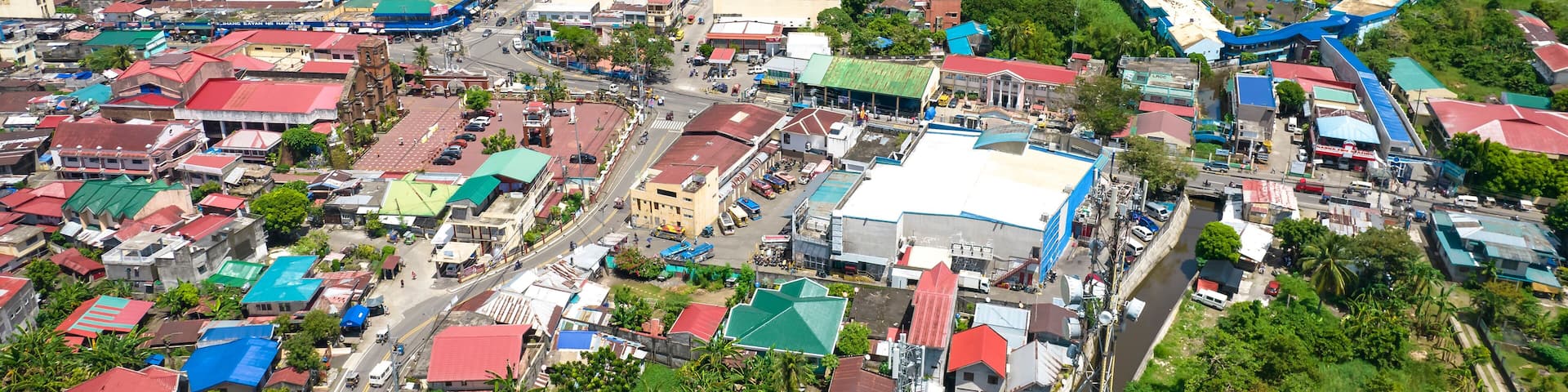 Nabua, Camarines Sur, Philippines - Aerial of the town of Nabua, with Mount Iriga in the background. A municipality in the Bicol Region.