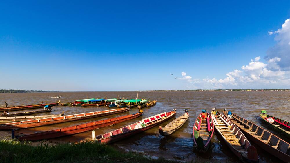 Colorful Small Wooden Ferry Boats At The Suriname French Guiana Border In Albina