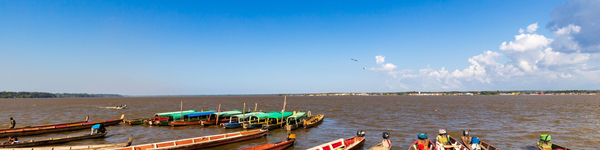 Colorful Small Wooden Ferry Boats At The Suriname French Guiana Border In Albina