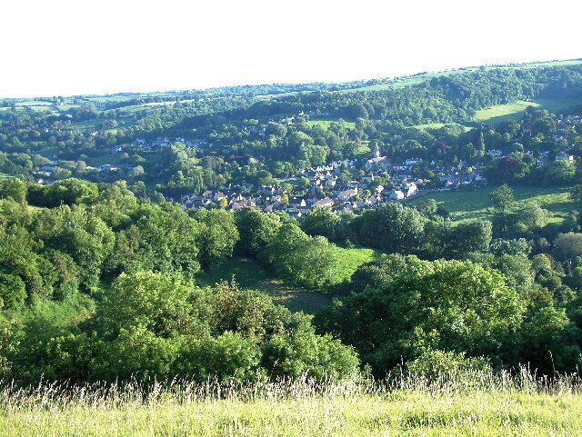 Woodchester village. Looking directly west from the edge of Minchinhampton Common. The lower large field to the right is adjacent to the famous Woodchester Orpheus mosaic, part of possibly the biggest and most opulent Roman Villa in the UK. A replica of the mosaic is on display nearby at Prinknash Abbey. Villa May have been home to the governing family of this important area, with Cirencester only 14 miles away and Bath 27 miles.