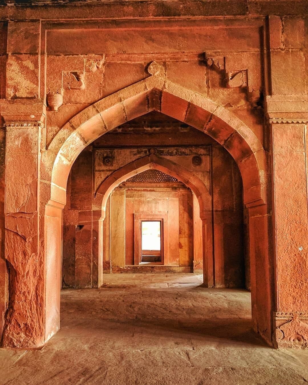 Akbar the great came to Fatehpur Sikri to seek the  Salim Chishti, a Sufi saint during India's mughal era, to bless him with a son. As his second wife, the Hindu Queen, Jodhabai, gave birth to his first son shortly after, he claimed the city as his good luck charm and built here his palace. Though a Muslim king, he was greatly influenced by various religions. His encouragement of a multi-faith society is clearly apparent in Fatehpur Sikri, which is a fusion of Hindu, Christian, Buddhist and Muslim architecture and motifs.