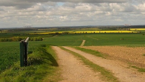 Open view The field gate opens up the wide expanse below. The two power stations on the horizon are West Burton to the right and Cottam to the left.