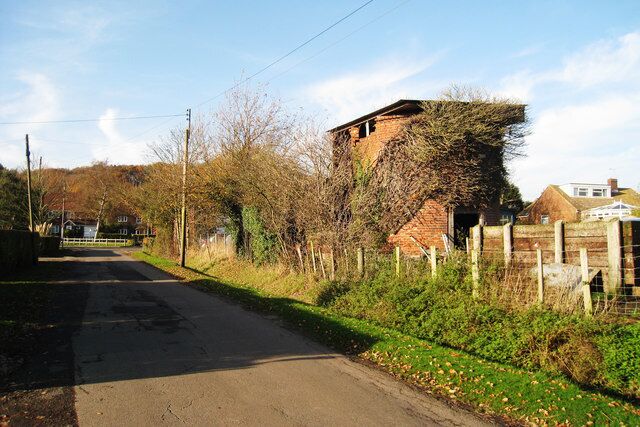 Oast House at Ash Tree Farm, Woodcock Lane, Grafty Green, Kent Unconverted single round kiln oast house. The conical roof now missing and replaced with a simple flat cover.