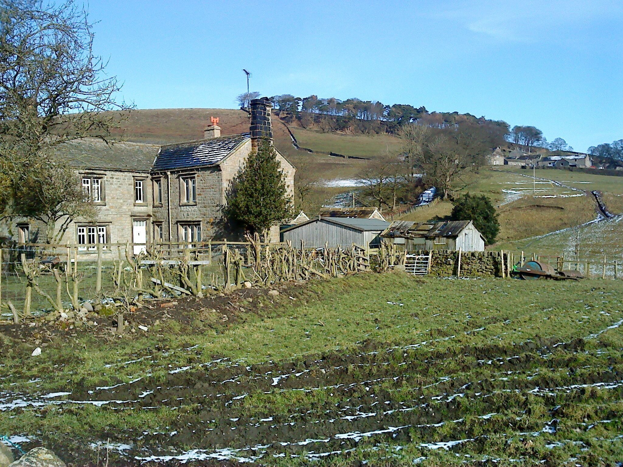 Low House Farm, Hazelwood The cluster of buildings on the hillside above Low House Farm is Hazelwood hamlet.