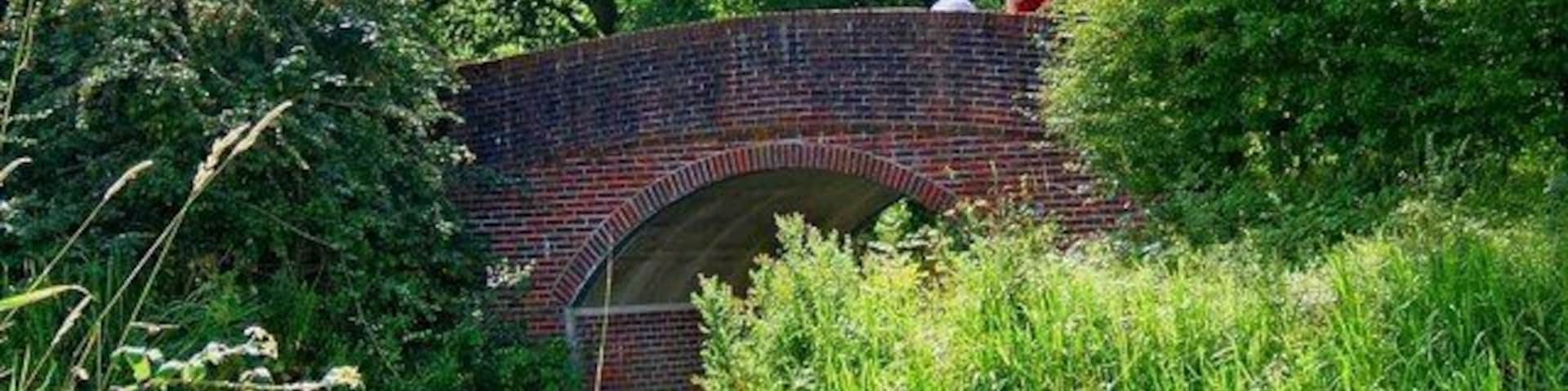 Brewhurst Bridge, Wey & Arun Canal Brewhurst Bridge was built in 1994. In the right foreground of this photograph can be seen part of a winding hole, for turning boats. For a view of the other side of the bridge:- 1436735.