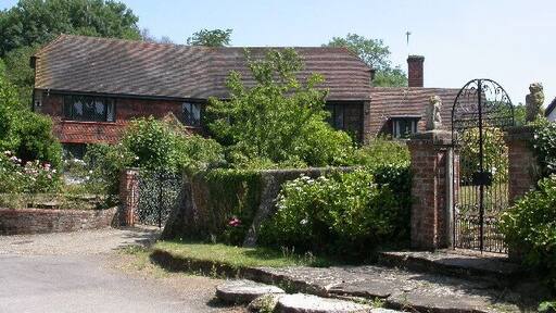 near Brewhurst Farm. Houses typical of this part of Sussex at the end of Brewhurst Lane.