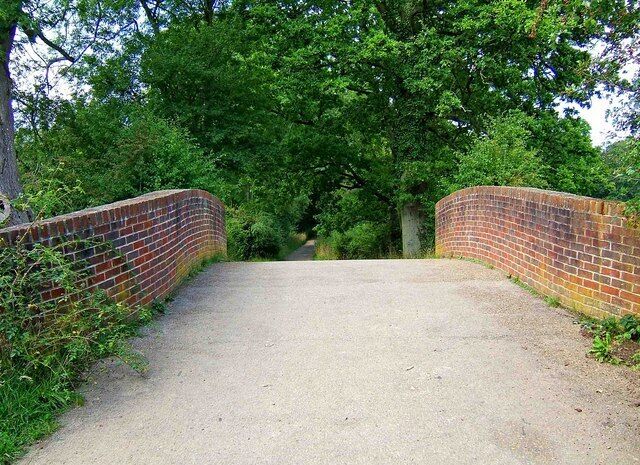 Brewhurst Lane & Brewhurst Bridge, looking north The heavily restored bridge takes Brewhurst Lane across the Wey & Arun Canal. 1438481.