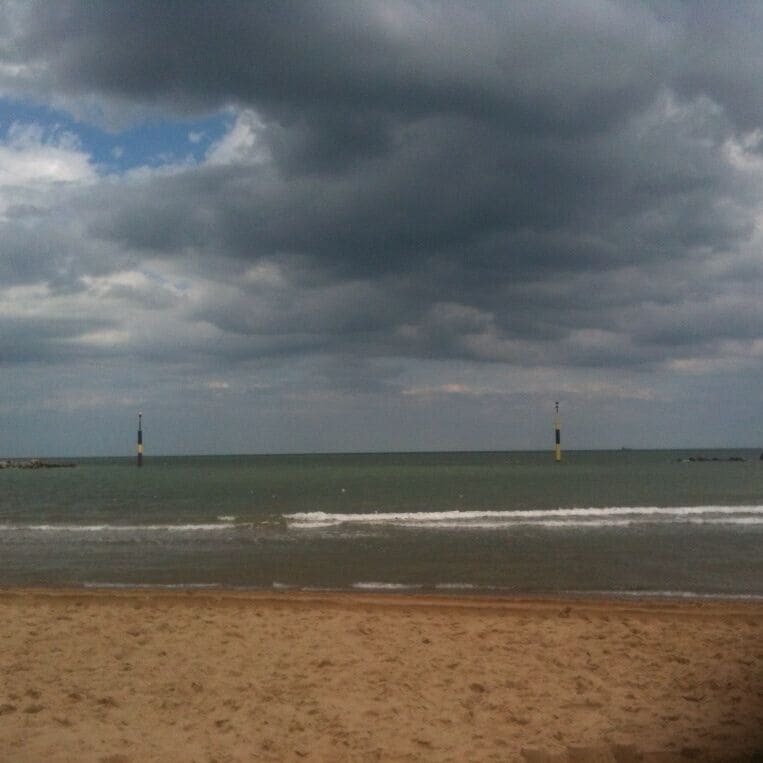 Classic day at the beach in England! Cloud, wind and sand. 