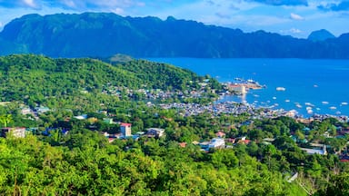 View of Coron Town and Bay from Mount Tapyas on Busuanga Island at sunset - tropical destination with paradise landscape scenery, Palawan, Philippines.
