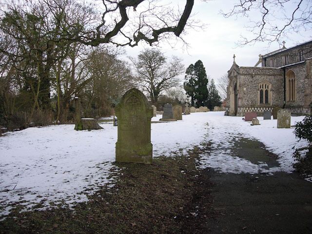 Part of St Mary's parish churchyard, Dullingham, Cambridgeshire, seen from the east in snow