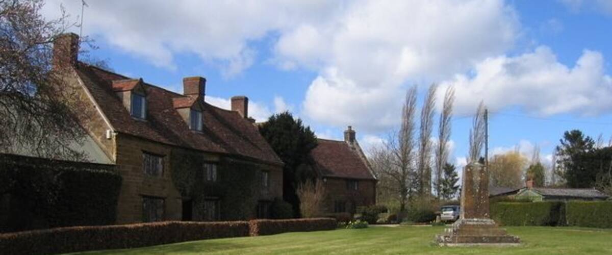 Church End, Priors Hardwick Another view of the houses beside the green and war memorial.
