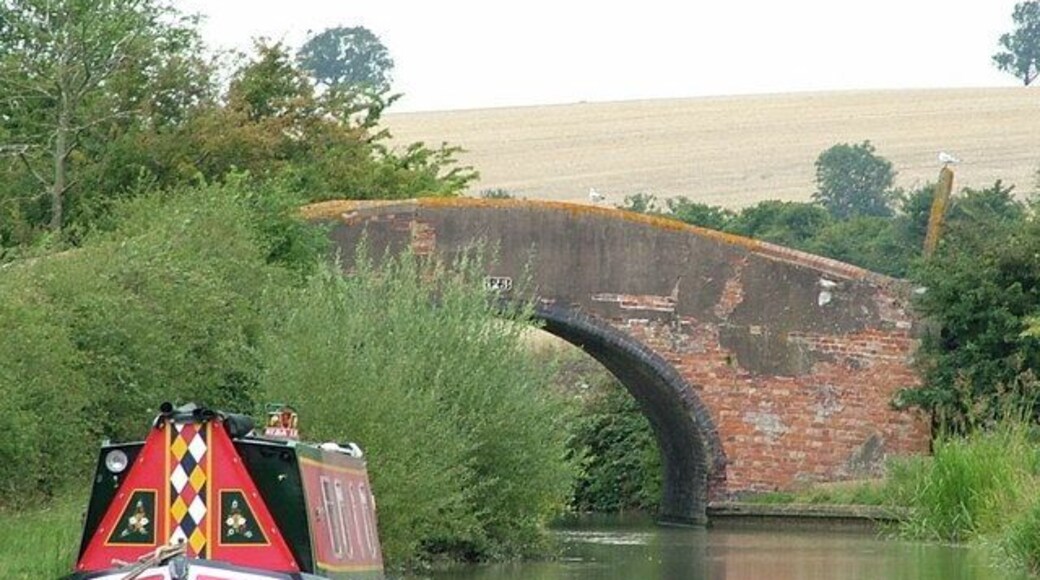 A narrowboat moored by Bridge 123 over the Oxford Canal northwest of Priors Hardwick, Warwickshire