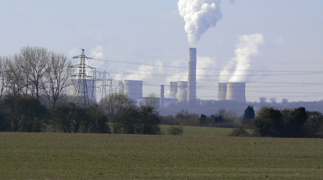 View from Pastures Lane The farmland in this area is predominantly arable these days due to the very fertile soil. In the distance is Ratcliffe Power Station.