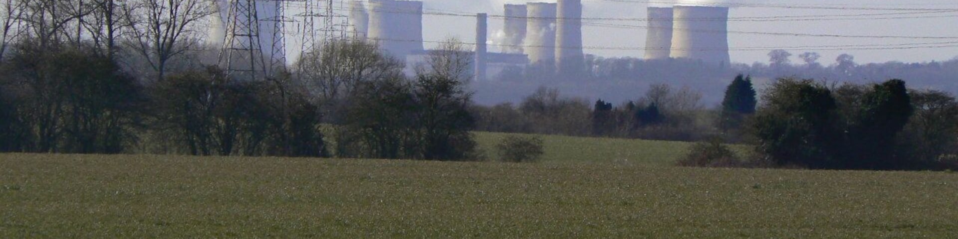 View from Pastures Lane The farmland in this area is predominantly arable these days due to the very fertile soil. In the distance is Ratcliffe Power Station.