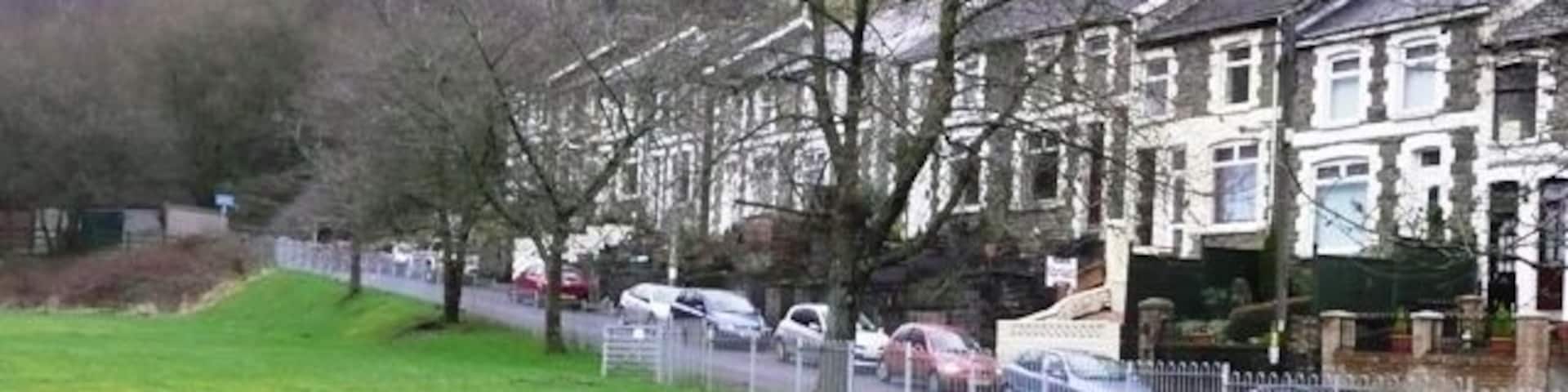 Six Bells recreation ground On of the few flat areas in this village. Cwm Nant-y-groes can be seen to the left. The square goes halfway up this valley.