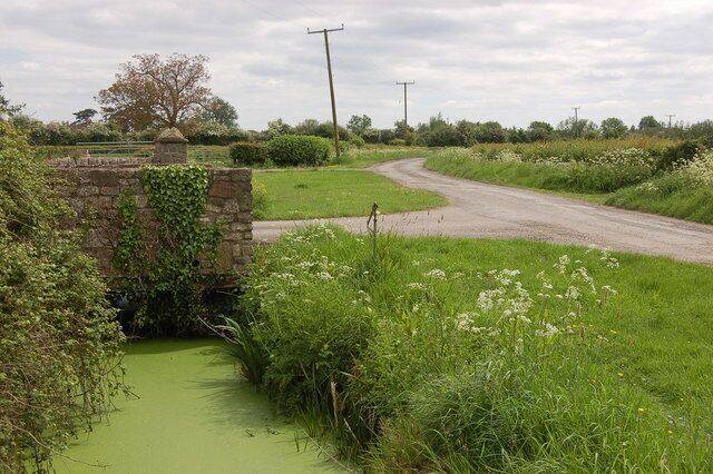 Longlands Lane crossing the Caldicot Levels View looks southwards along Longlands Lane towards the village of Redwick. The Caldicot Levels are drained by several prominent dykes including the one in the left foreground.