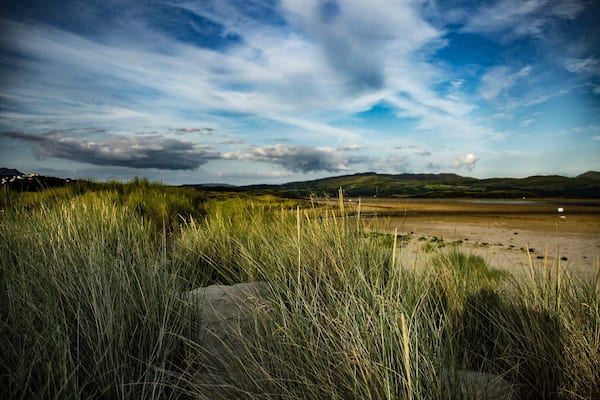 Black Rock sands Porthmadog Wales Uk. About an hour before the sun setting.
Thereâs plenty of accommodation in the area and right next to the beach. The beach itself is large and has panoramic views, you can also drive your car onto the beach for a fee so ideal for day trips in the car.