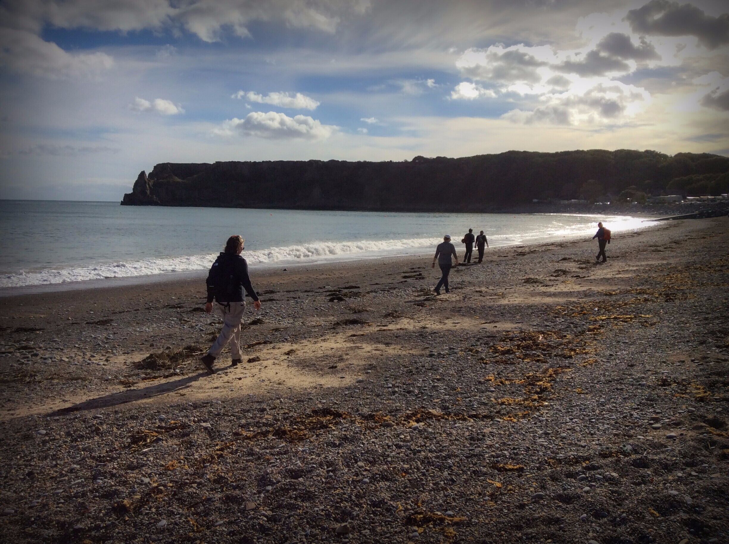 Great works are performed not by strength but by perseverance.
Samuel Johnson

This day of hiking was filled with plenty of up and down sections.  As well, it was the longest stretch of a four day/50 mile journey.  However, the sound of the oceans laughter, the feel of the sun's breath and the feast of vistas fuelled our perseverance making the hiking easier.

The hiking party, seen here enjoying the beach of Lydstep, is the embodiment of perseverance and all of its members well accomplished (excluding me...I'm a bit of a bohemian good at wasting the day away...but I like it that way).
#hiking