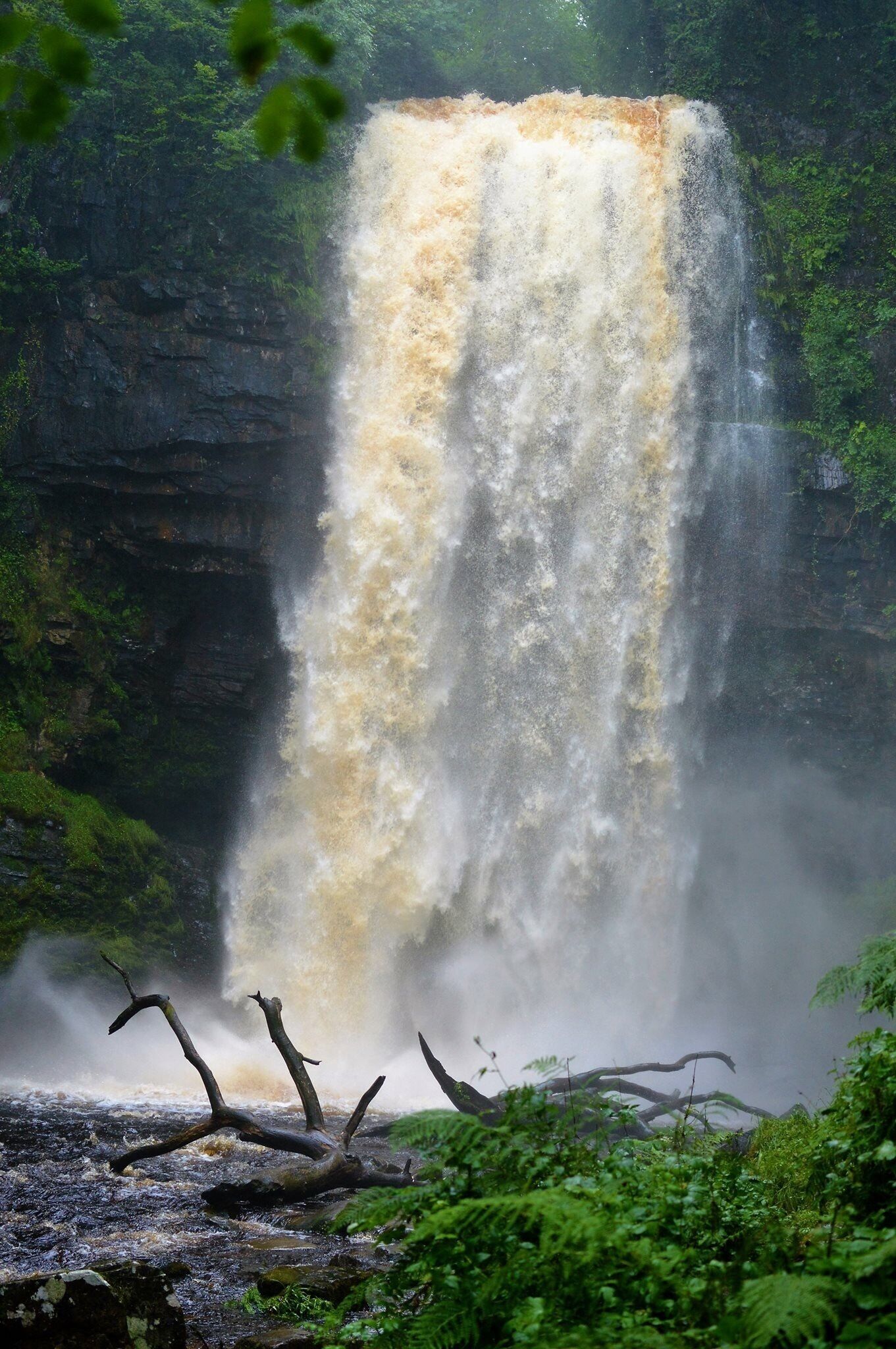 Henrhyd Falls! This huge waterfall was used as the entrance to the Bat Cave in Dark Night Rises! You can actually walk into the small cave hiding behind the waterfall. Stunning!  Nice work Nature!! #waterfall #batman #super