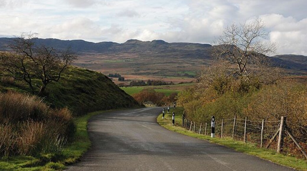 Eastern approach to Trawsfynydd Holiday Village Linking the Trawsfynydd to Abergeirw mountain road to the holiday village and the A470. In the distance lie the northern Rhinogydd, with Moel Ysgyfarnogod prominent.