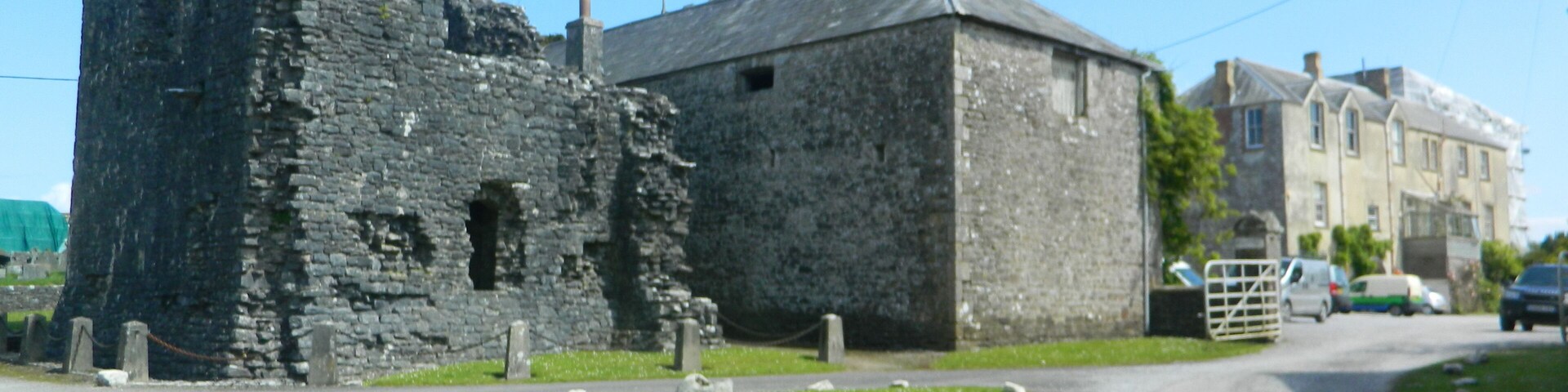 Ruins of Ewenny Priory, farm building, and mansion.