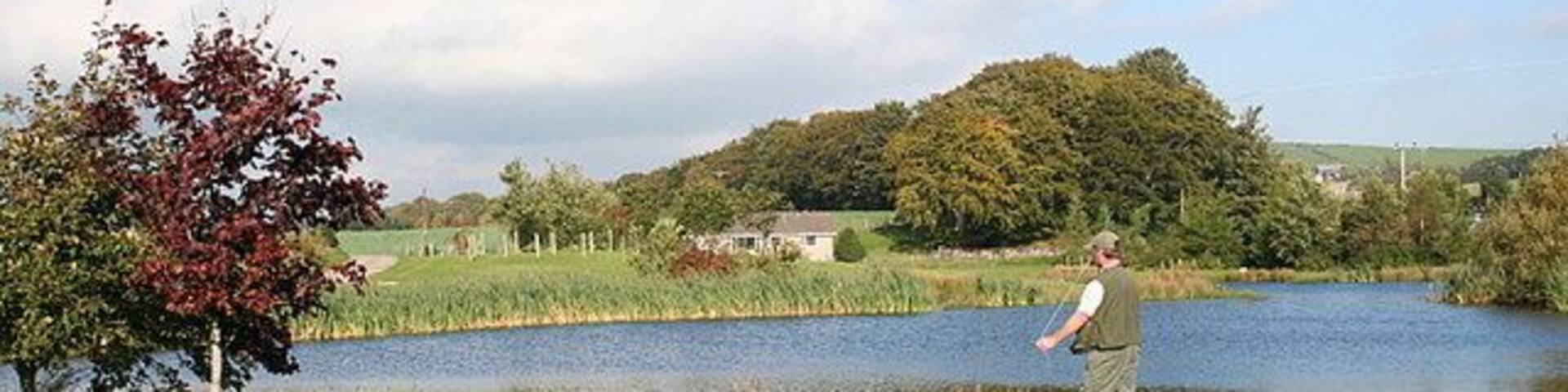 Angler trying his skill at Mossat Fishery.