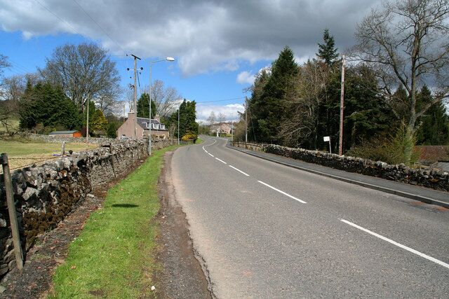 Bonchester Bridge North end of Bonchester Bridge looking towards the War Memorial at the junction of the B6357 with the A6088.