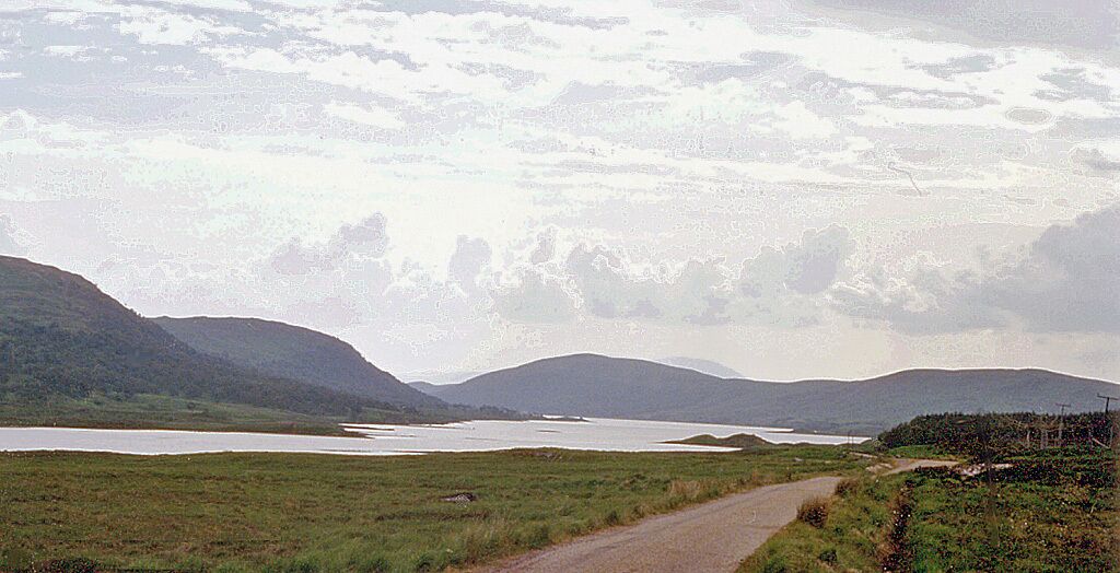 Head of Loch Naver, from B873 near Dal Harrald. A desolate road down from Bettyhill along Loch Naver to Altnaharra (of Weather Forecsat fame). On the left are the slopes of Ben Klibreck