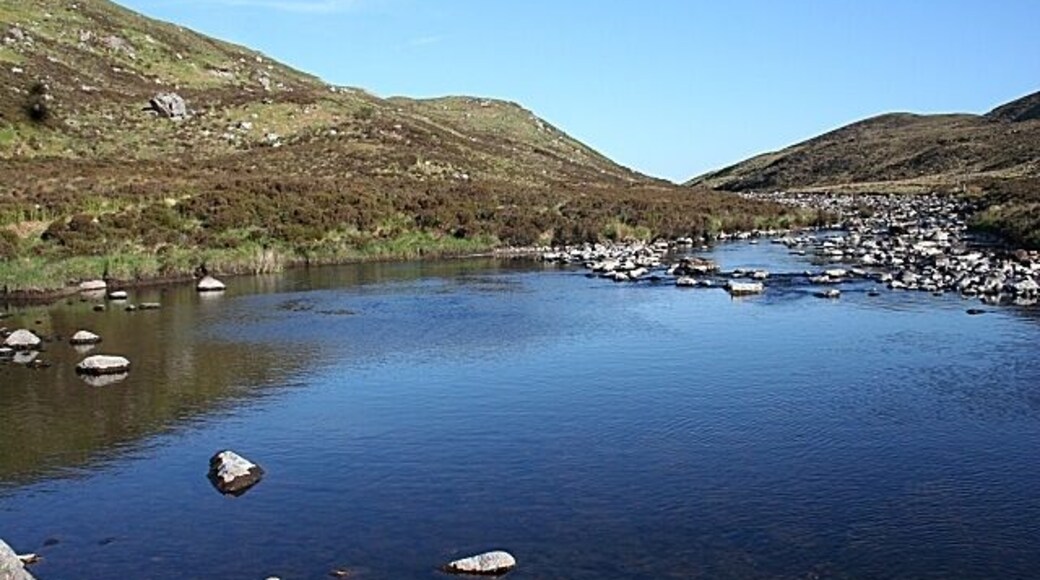 Rhiconich River This pool is created by a barrier of boulders, so that there are pools for salmon to lie and anglers to catch them, in spite of the low water level.
