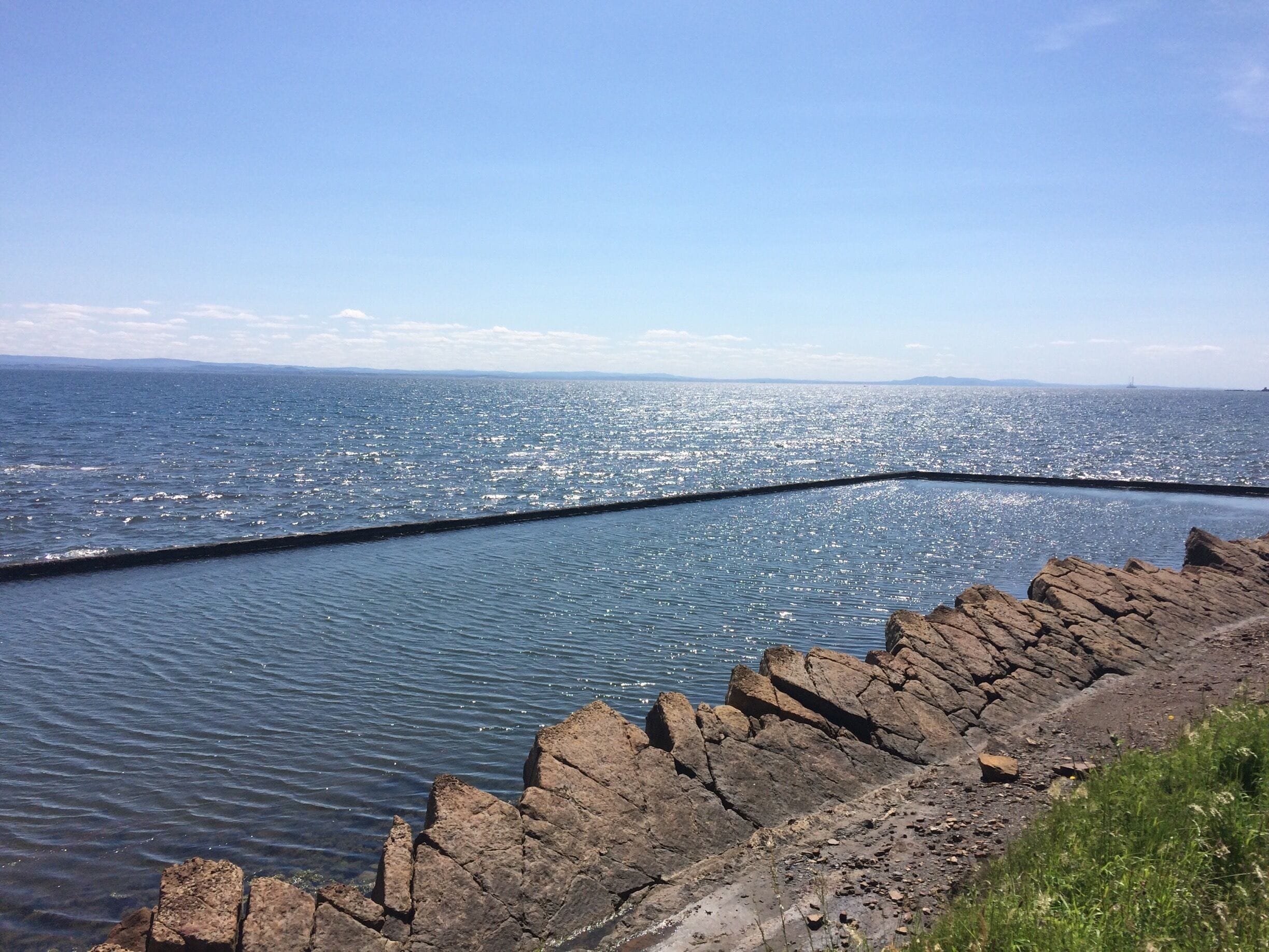No longer maintained, this tidal pool in st Monans sparkling in the summer sun