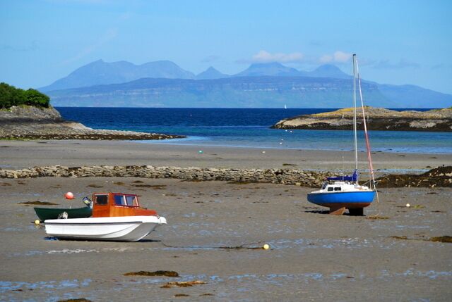 Eigg & Rum from Glenuig Only oystercatchers for company here. Rum towers above the Sgurr of Eigg.