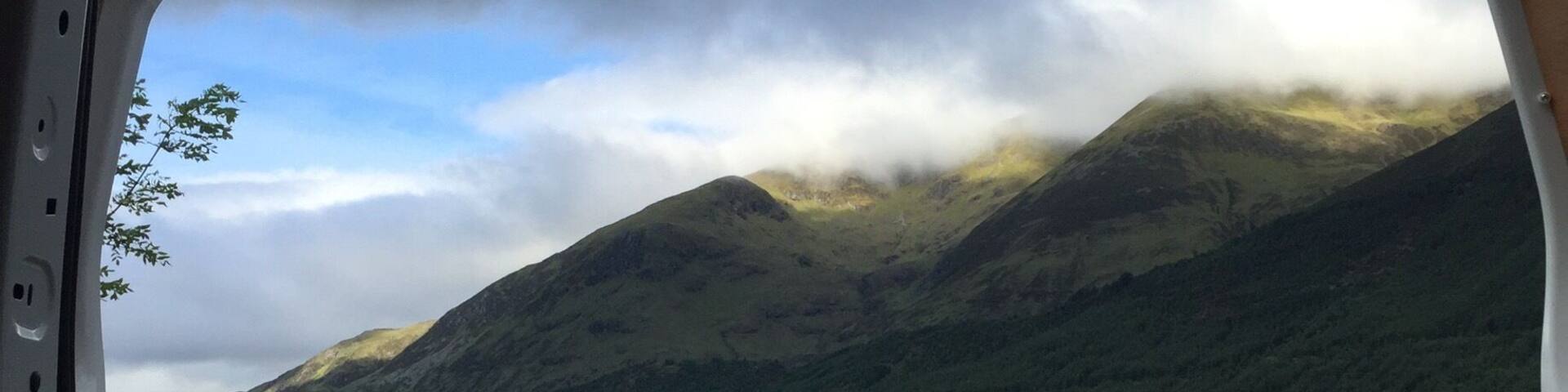 #view #car #mountains #earlymorning